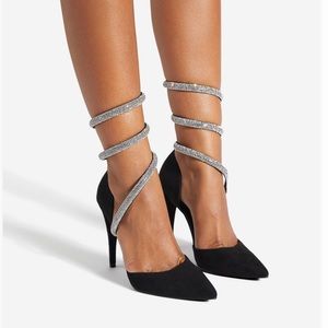 A pointed-toe pump with an ankle-wrap